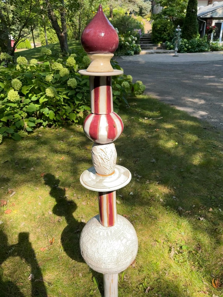 Catharina Goldnau beside her ceramics display at the Uxbridge Studio Tour